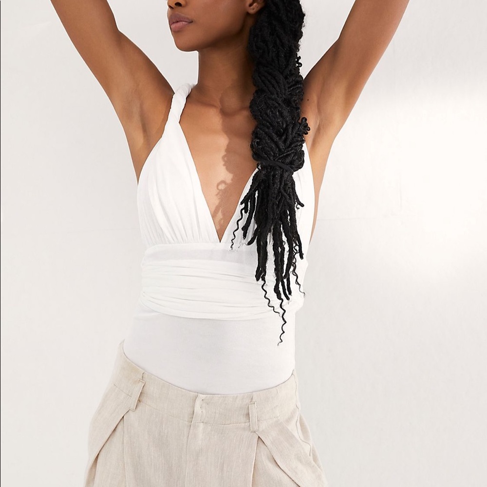 Free People 100 convertible ways bodysuit. White brand new Medium
